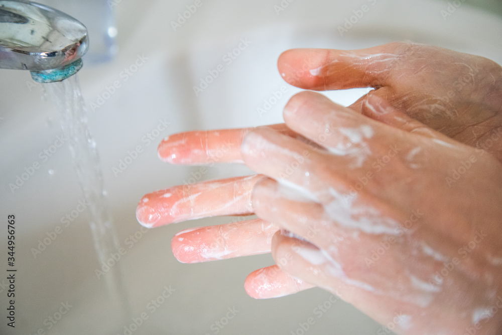 Washing hands rubbing with soap man for corona virus prevention, hygiene to stop spreading coronavirus. Washing hands rubbing with soap man for corona virus prevention, hygiene to stop spreading coronavirus.