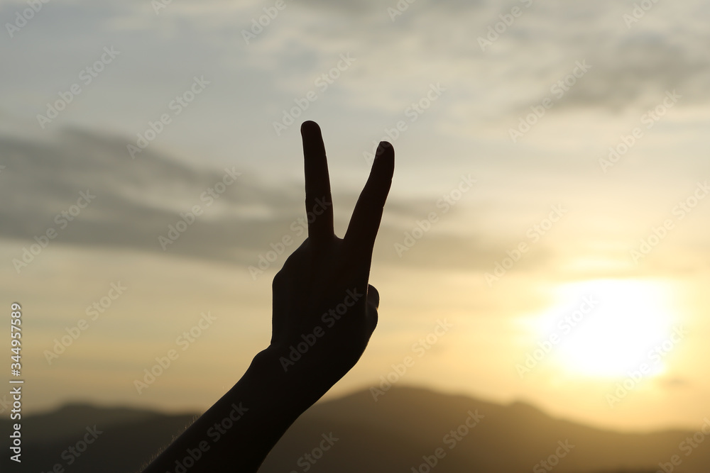 two fingers hand language with scenery backgrounds