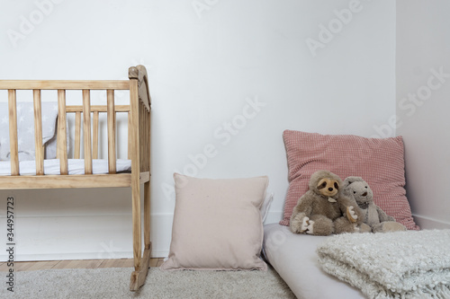 Kid's room with toys and baby bed