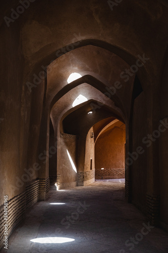 Covered passageway in the old town of Yazd photo