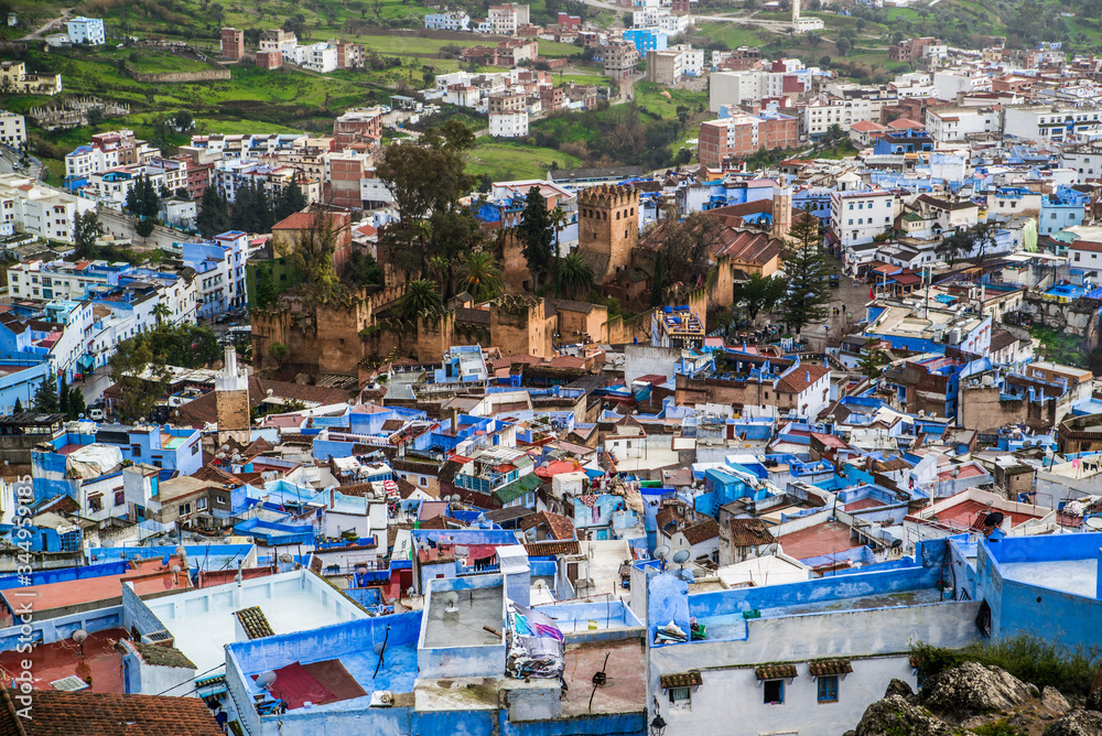 panoramic view of castle in the middle of blue city morocco
