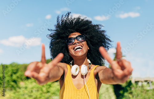 Afro woman hanging out in the city photo