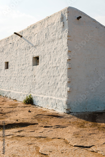 White walls humble house side view in rural area of India