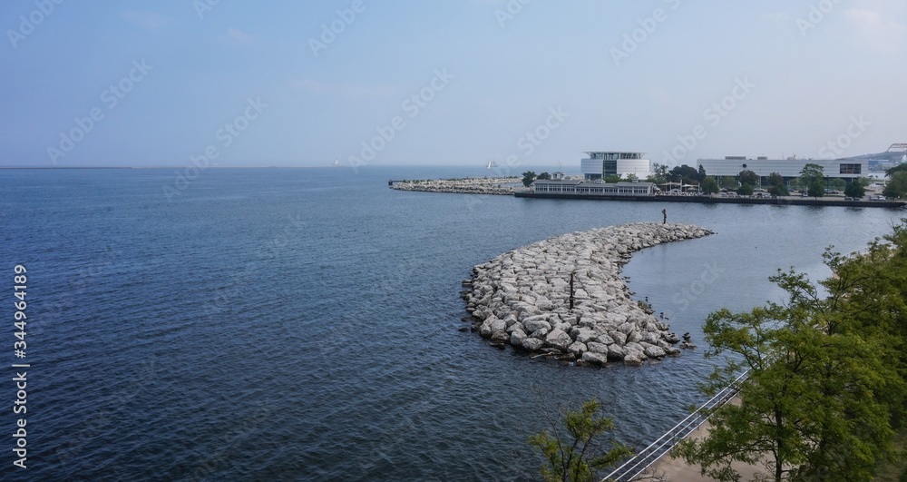 Milwaukee,Wisconsin,USA-09/03/2015. A lake view with the shore line and pier.