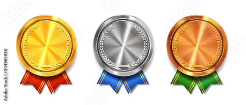 Gold, silver and bronze medals realistic set with ribbons. Winner awards symbols