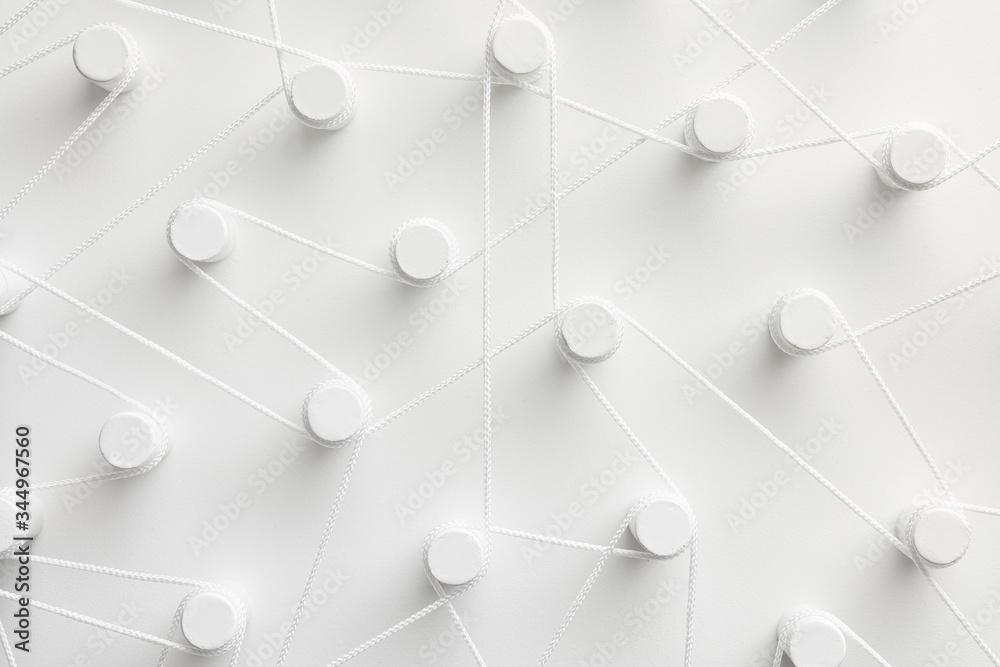 © 365mm/Stocksy - Connexion of white threads © 365mm/Stocksy - Connexion of white threads