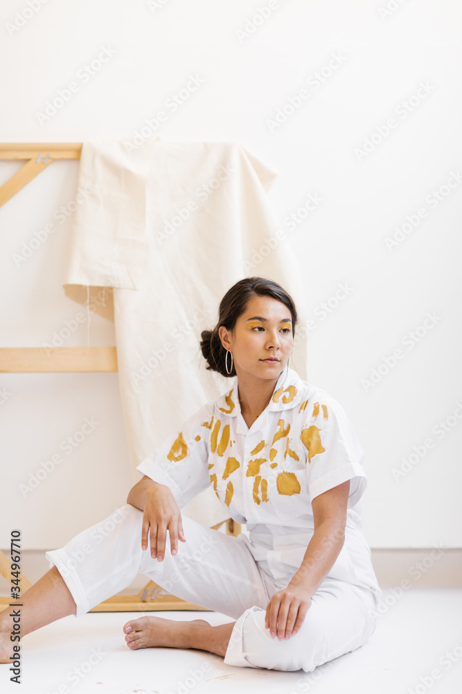 portrait of young woman with hand painted clothing portrait of young woman with hand painted clothing