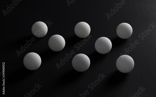 abstract geometric white balls isolated on black background