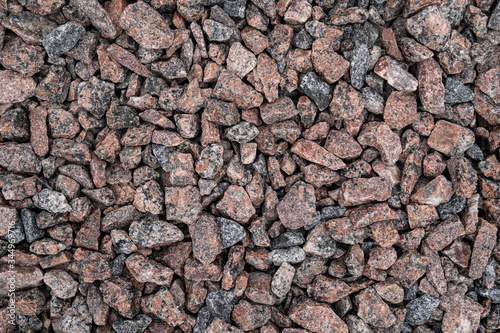 Texture with small stones background. Rough surface