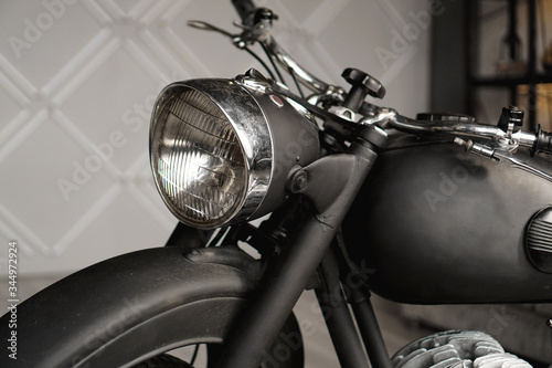 Motorcycle close-up in the room. Photo from the studio photo