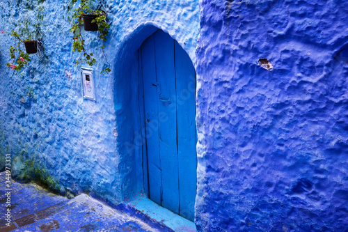 Traditional decorated door in the blue city of Chefchaouen, near the Rif mountains, Morocco