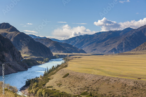 White mountain river in Altai. Altay where Russia, China, Mongolia, and Kazakhstan come together, and where the rivers Ob and Irtysh have their headwaters. Russia