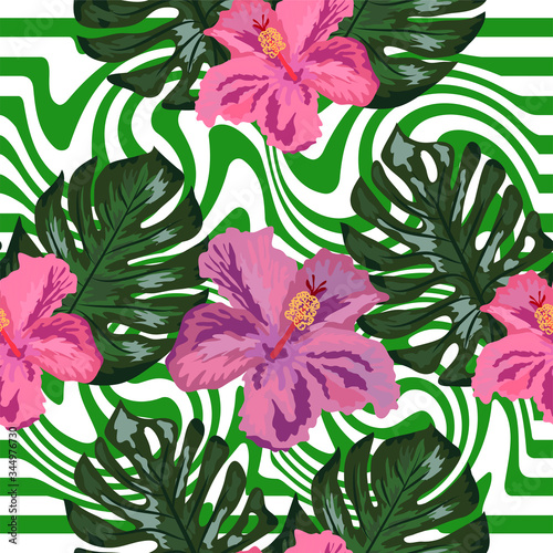 Seamless pattern with tropical orchid and hibiscus flowers, palm, monstera leaves on striped background. © MichiruKayo
