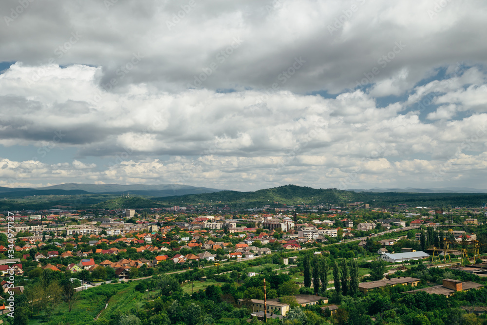 Beautiful panoramic view of Mukachevo, Ukraine from the top of The Palanok Castle or Mukachevo Castle at bright sunny day