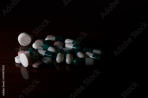 medicine pills for health, Concept photo with dramatic light, copy space and black background
