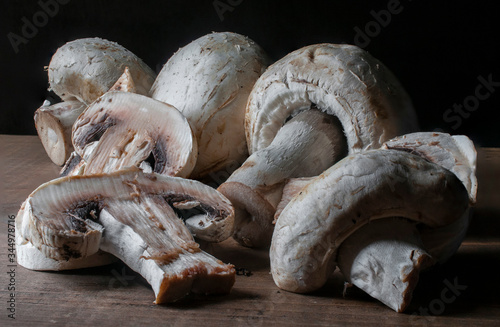 Canvas Print Close up an image or macro photography of mushrooms in a dark environment, low key light, or dark food, using the chiaroscuro concept
