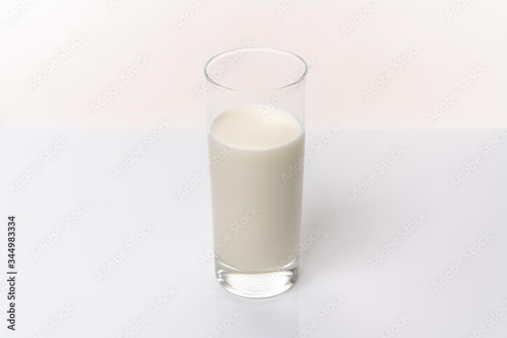 Milk in a glass isolated on white background. Protein rich dairy product Milk in a glass isolated on white background. Protein rich dairy product