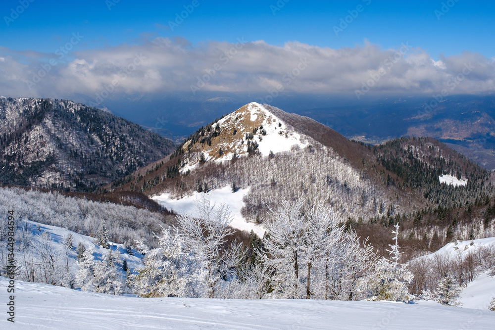 Mozic mountain in Slovenian alps in winter