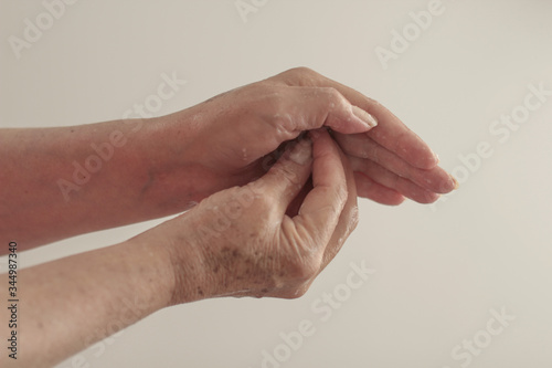hands of the elderly woman