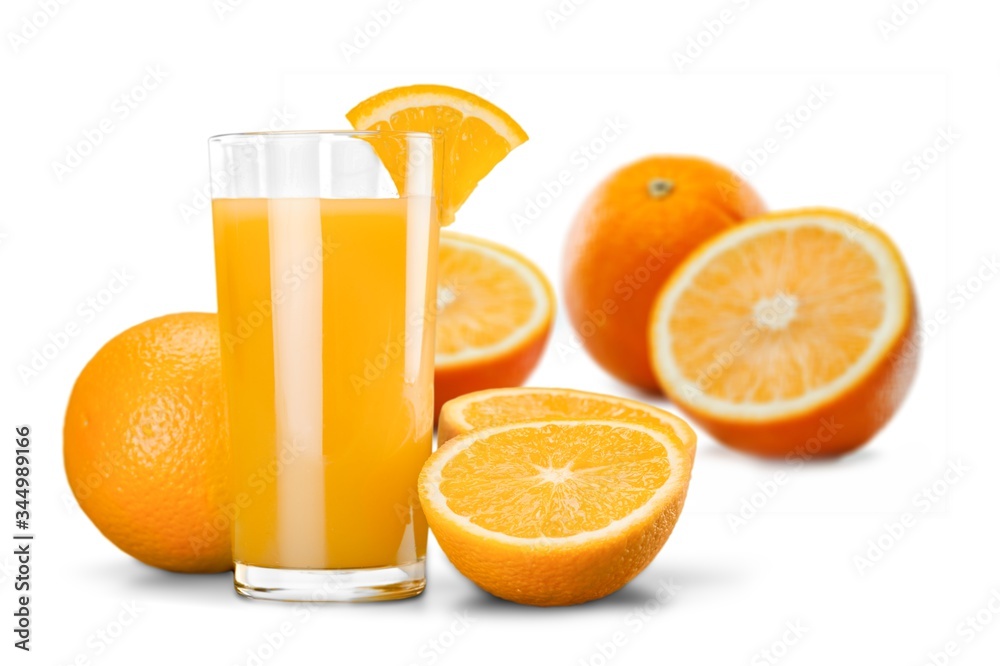 Orange juice in glass and slices of orange fruit Orange juice in glass and slices of orange fruit