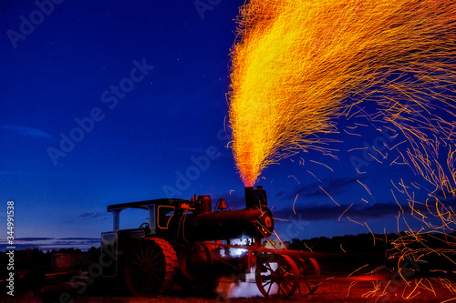 Steam Engine and Sparks at Night