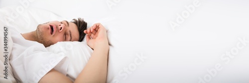 Foto Tired Young Man Snoring