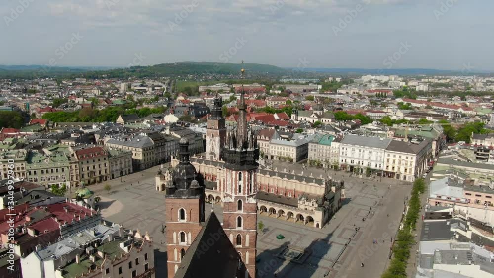 Flying over Main Square, Rynek Glowny in Krakow, Cracow city in Poland, Polska Flying over Main Square, Rynek Glowny in Krakow, Cracow city in Poland, Polska