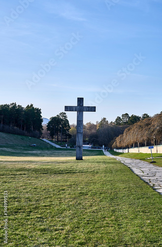 The granite cross at the forest cemetery in Enskede photo