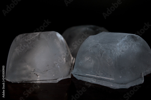 ice cube details, Concept photo with dramatic light and black background
