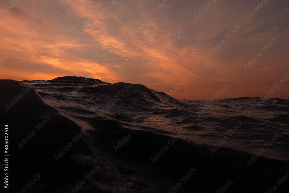 Naklejka premium Sea wave low angle view in morning. Ocean water background. ocean wave close up view