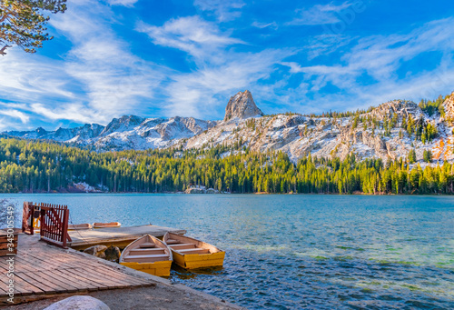 Fototapeta Naklejka Na Ścianę i Meble -  Boats at dock on Lake George under Crystal Crag  at Mammoth Lakes, CA