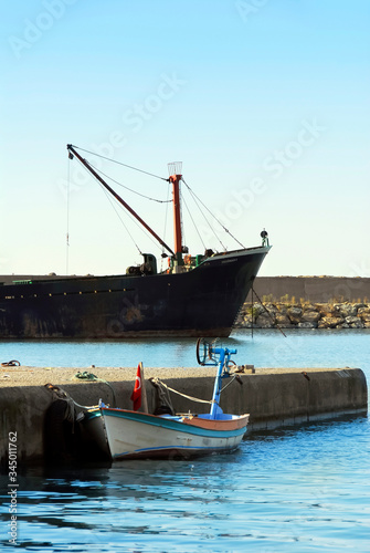 TRABZON  TURKEY - SEPTEMBER 24  2009  Port  Freighter and Boat. Of District