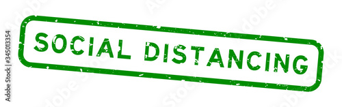 Grunge green social distancing word square rubber seal stamp on white background