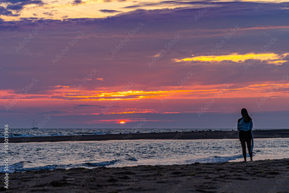 Sunset on the beach on north side of the Provincelands Cape Cod, Atlantic ocean view MA US.