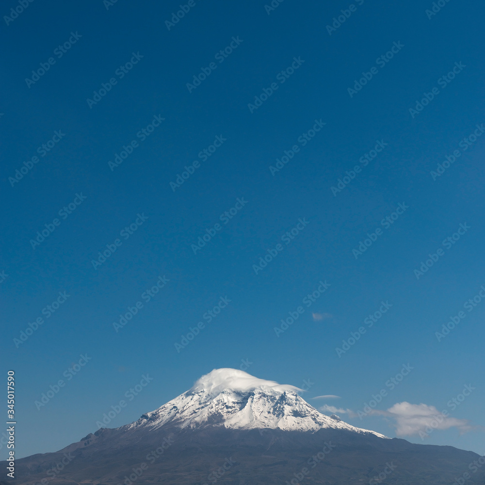 Square format of the snowcapped Chimborazo Volcano peak with copy space, Andes Mountain Range, Ecuador.