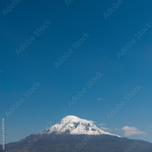 Square format of the snowcapped Chimborazo Volcano peak with copy space, Andes Mountain Range, Ecuador. © SL-Photography