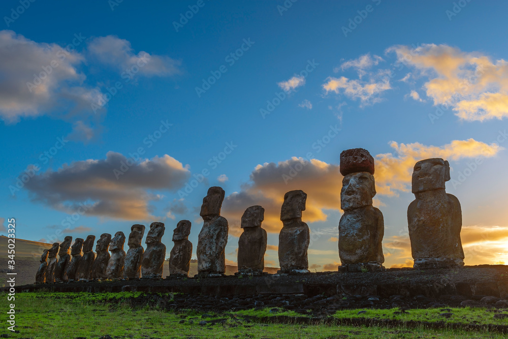 Silhouette of Moai Statues at Sunrise, Ahu Tongariki, Easter Island (Rapa Nui), Chile.
