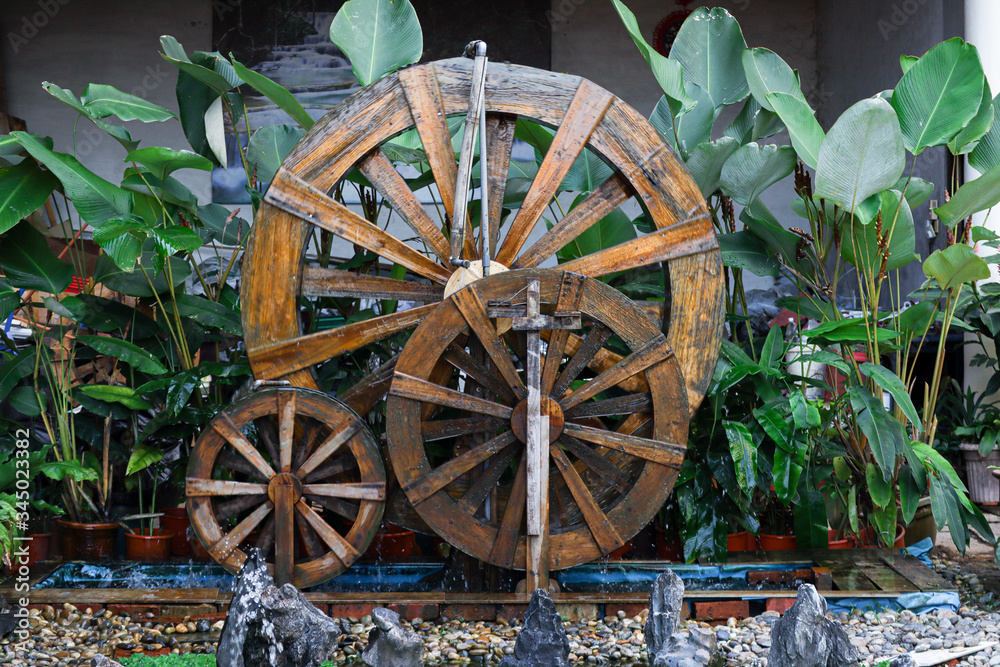wooden wheel and flowers