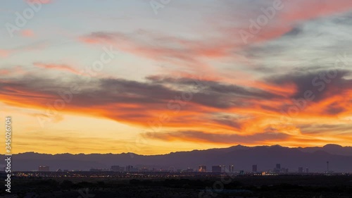 Sunset time lapse of the beautiful strip skyline with red clouds