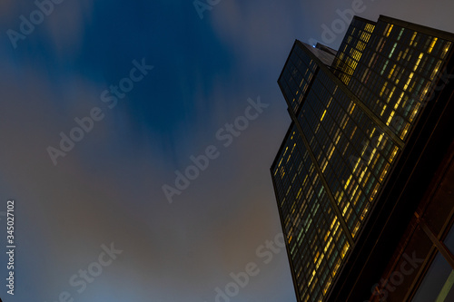 Upward View of Chicago Skyscraper at Night