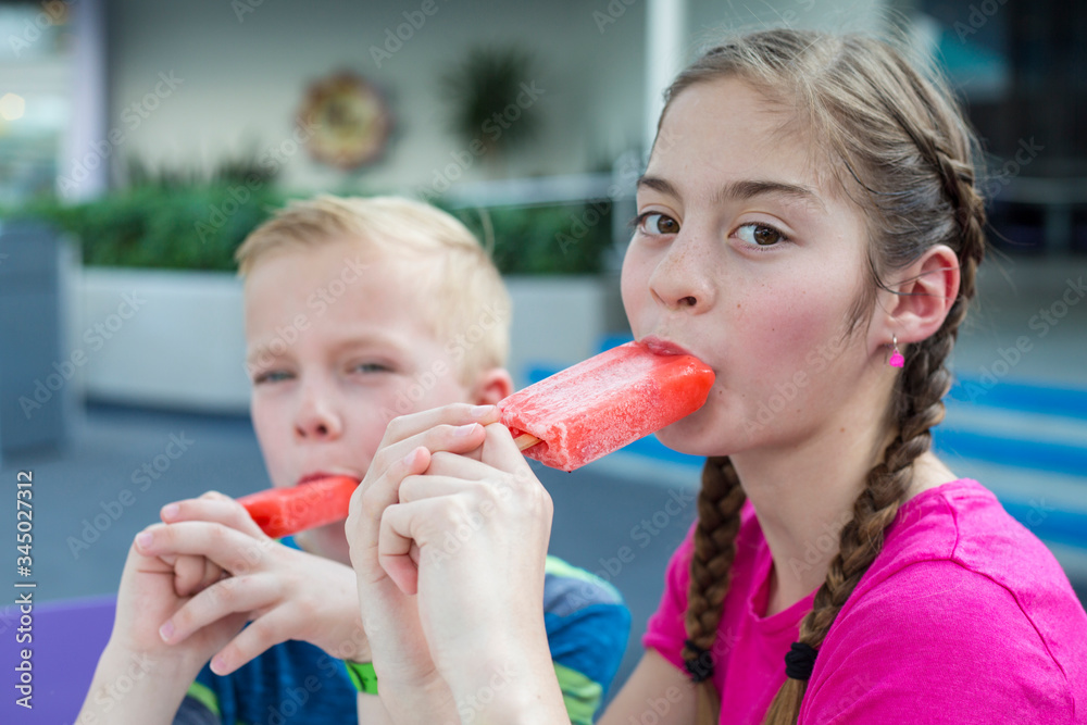 Woman Eating Popsicle