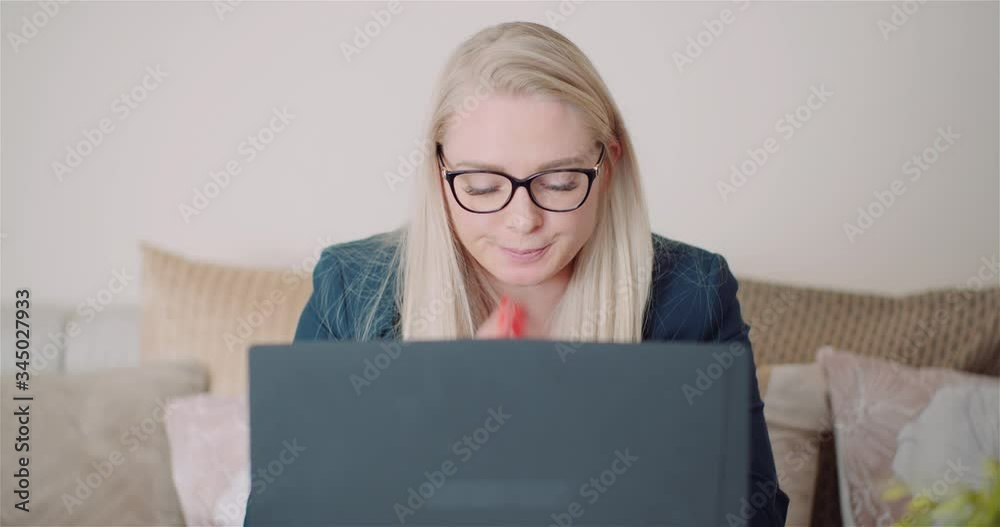 Female Entrepreneur Using Laptop In Office Female Entrepreneur Using Laptop In Office