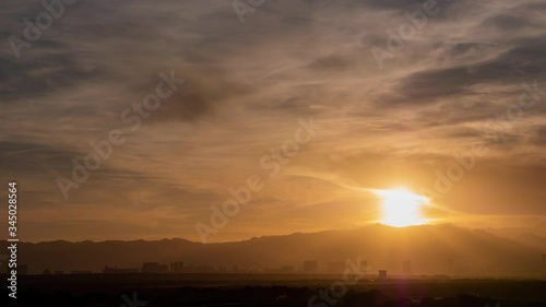 Sunset time lapse of the beautiful strip skyline with red clouds