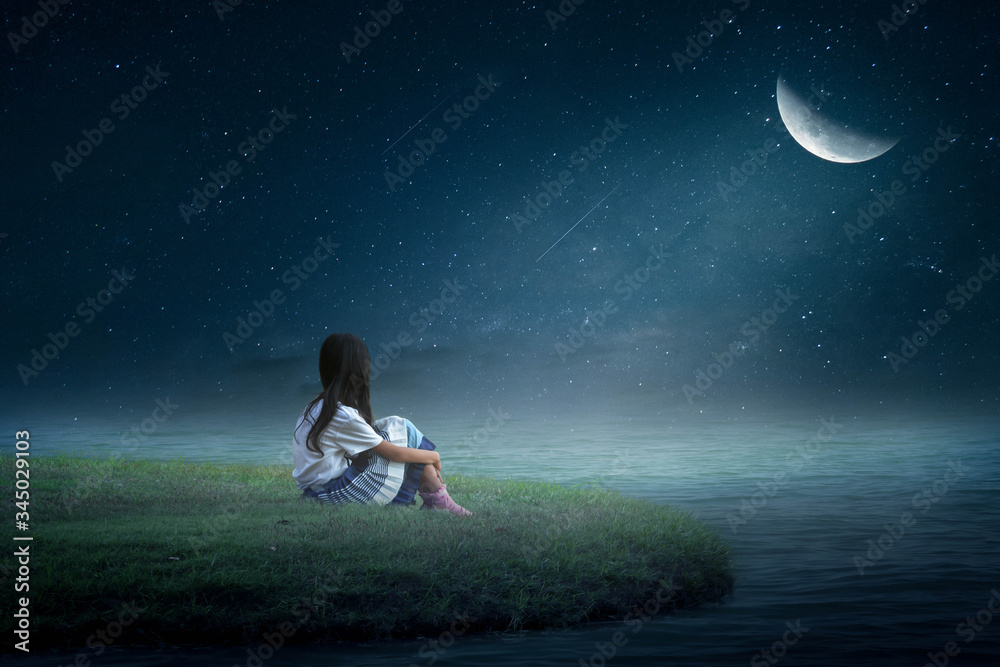 young woman sitting on the moon young woman sitting on the moon