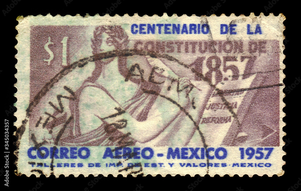 MEXICO - CIRCA 1957: a stamp printed in the Mexico shows Allegorical figure writing the law, Centenary of 1857 Constitution, circa 1957
