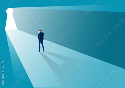 businessman standing in front of key challenge concept
