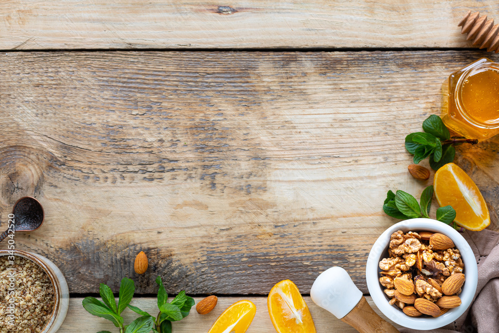 set of products to boost the immune system. Honey, lemon, nuts, ginger to Immunity boosting. top view. Copy space set of products to boost the immune system. Honey, lemon, nuts, ginger to Immunity boosting. top view. Copy space