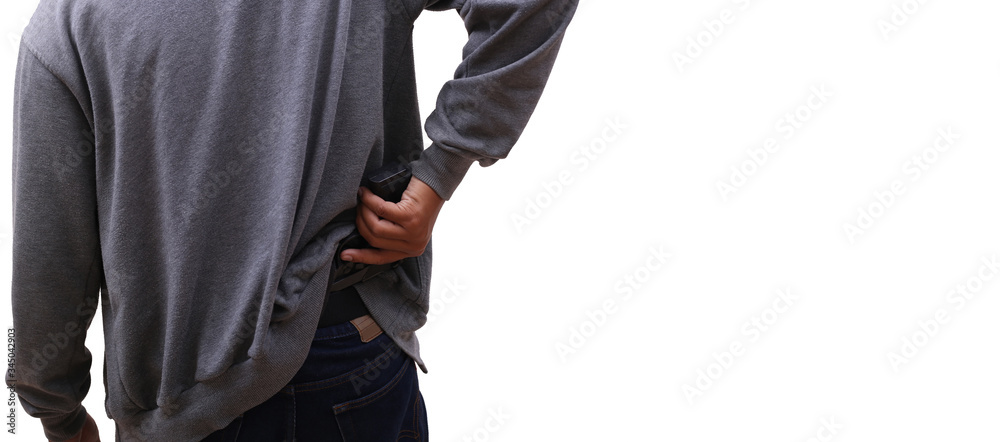 man taking gun from the waist, isolated in white man taking gun from the waist, isolated in white