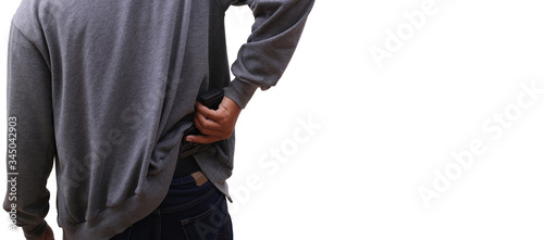 man taking gun from the waist, isolated in white