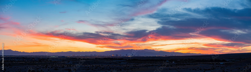 Sunset view of the beautiful strip skyline with red clouds
